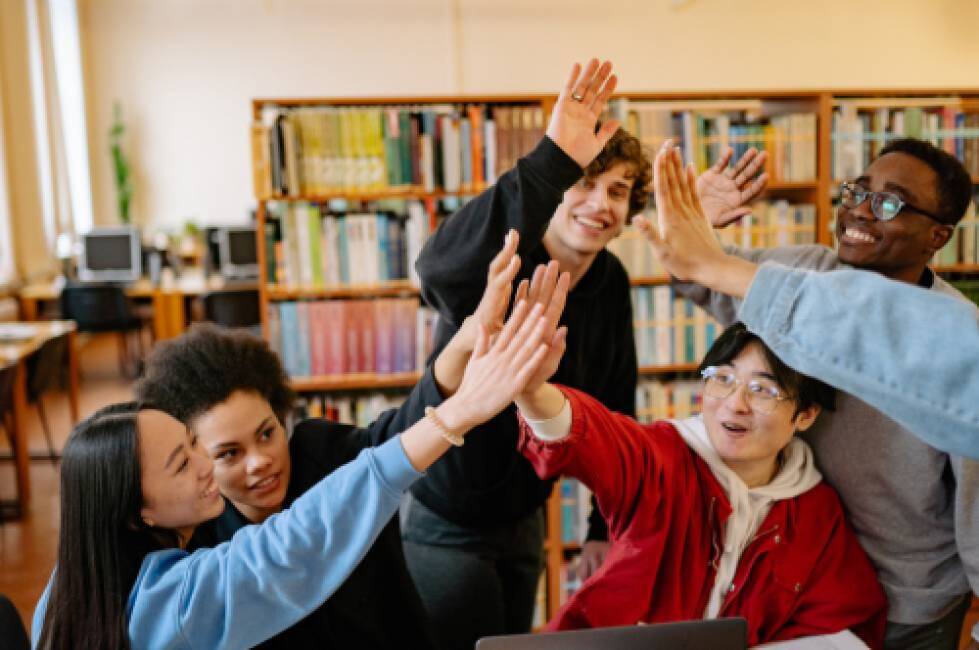 Students high-fiving